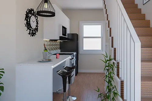 Kitchen and stairs in the Gonzales Modern Living plan