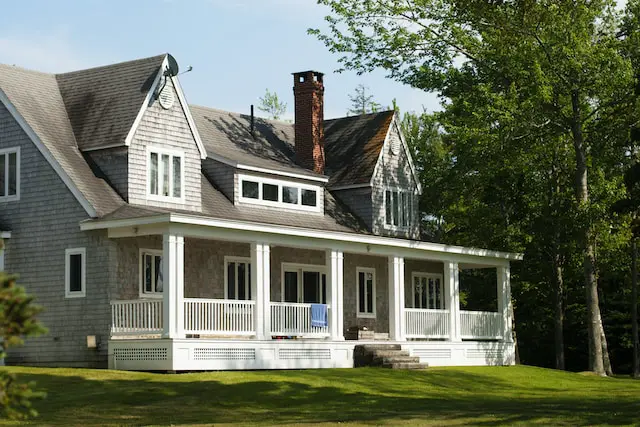 Farmhouse-style home with a covered front porch